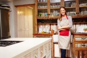 woman kitchen apron organizing unpacking