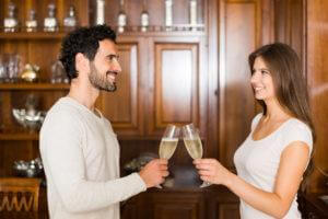 Couple celebrating with champagne easy move